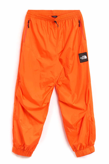 THE NORTH FACE X YINKA ILORI Unisex Outer Layer Windbreaker Trousers Orange 
